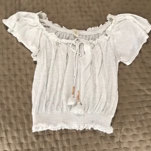 We the free off the shoulder white tassel top